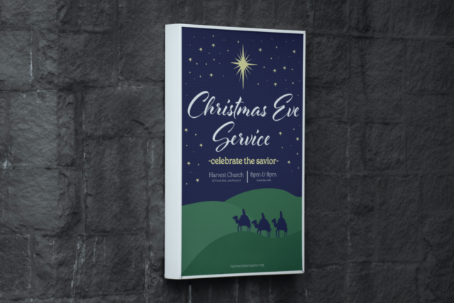 A Christmas Eve service graphic for a church framed and on a wall.